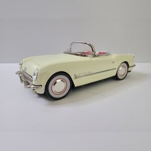 Vintage Deluxe Open Sedan toy car in original box.Classic cream-colored convert